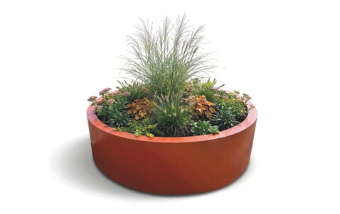 Runder Planter als schützendes Freiraummobiliar