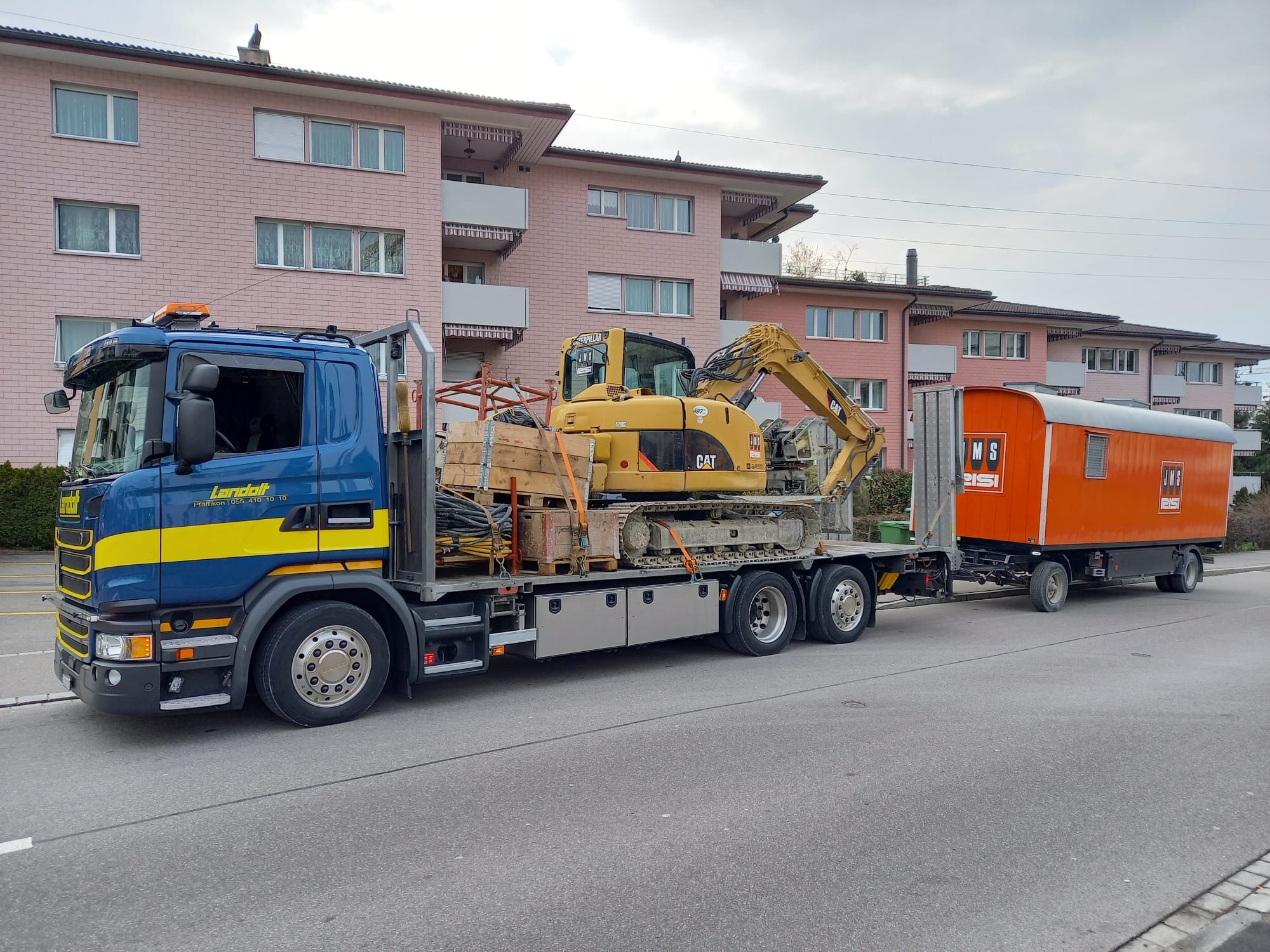Baumaschine CAT Inkl. Baucontainer